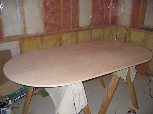 Additional workshop view of cut the baseboard and raceway (photo 3) during a DIY poker table build